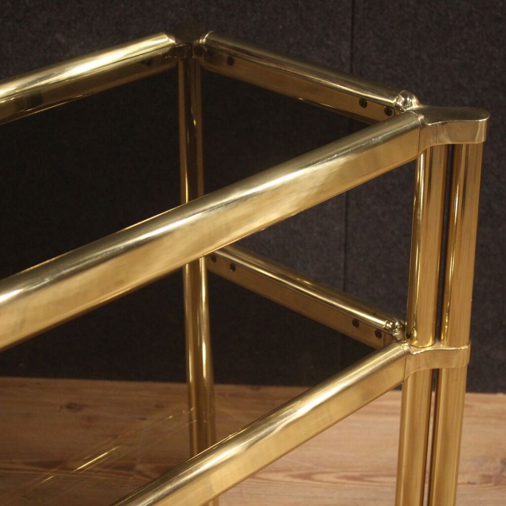 Italian console in gold metal