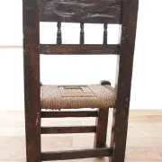 17th-century farmhouse chair with carved motifs – wabi sabi