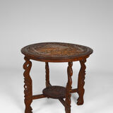 Asian coffee table carved with dragons and peacocks, Indonesia, early 20th century