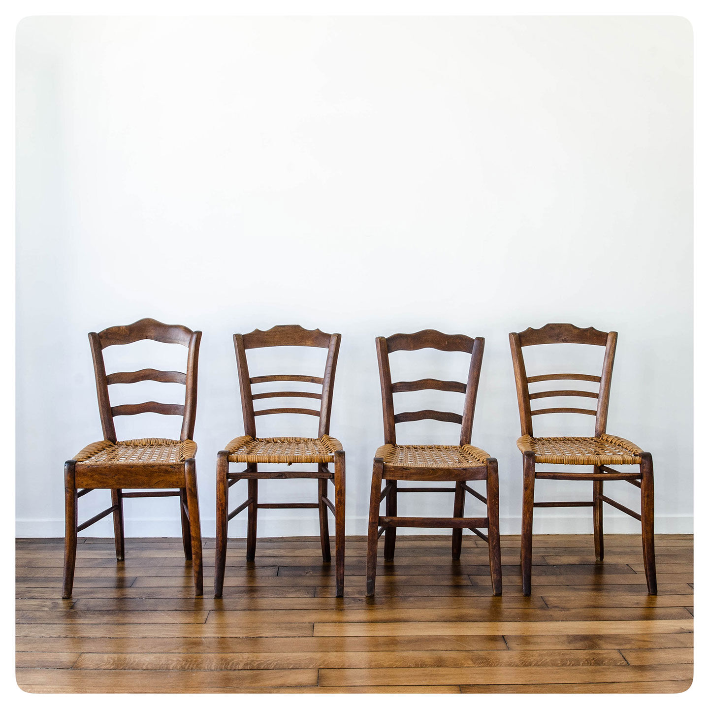 4 old flying chairs with natural canning seat