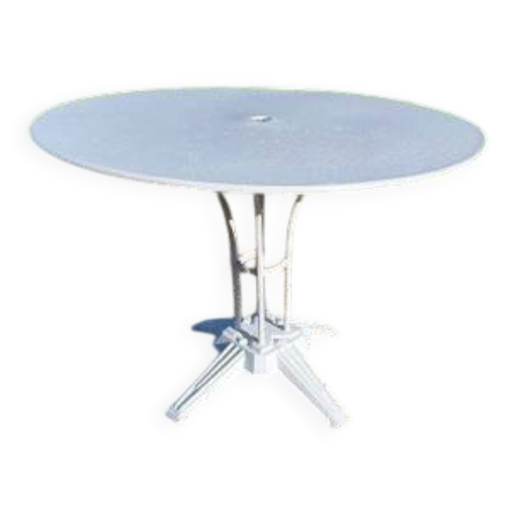 Garden table with a cast iron base and a metal top.