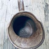 Pitcher in old sandstone