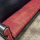 Vintage black and red sofa / three-seater / sofa bed