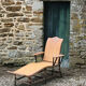 Old rattan lounger.