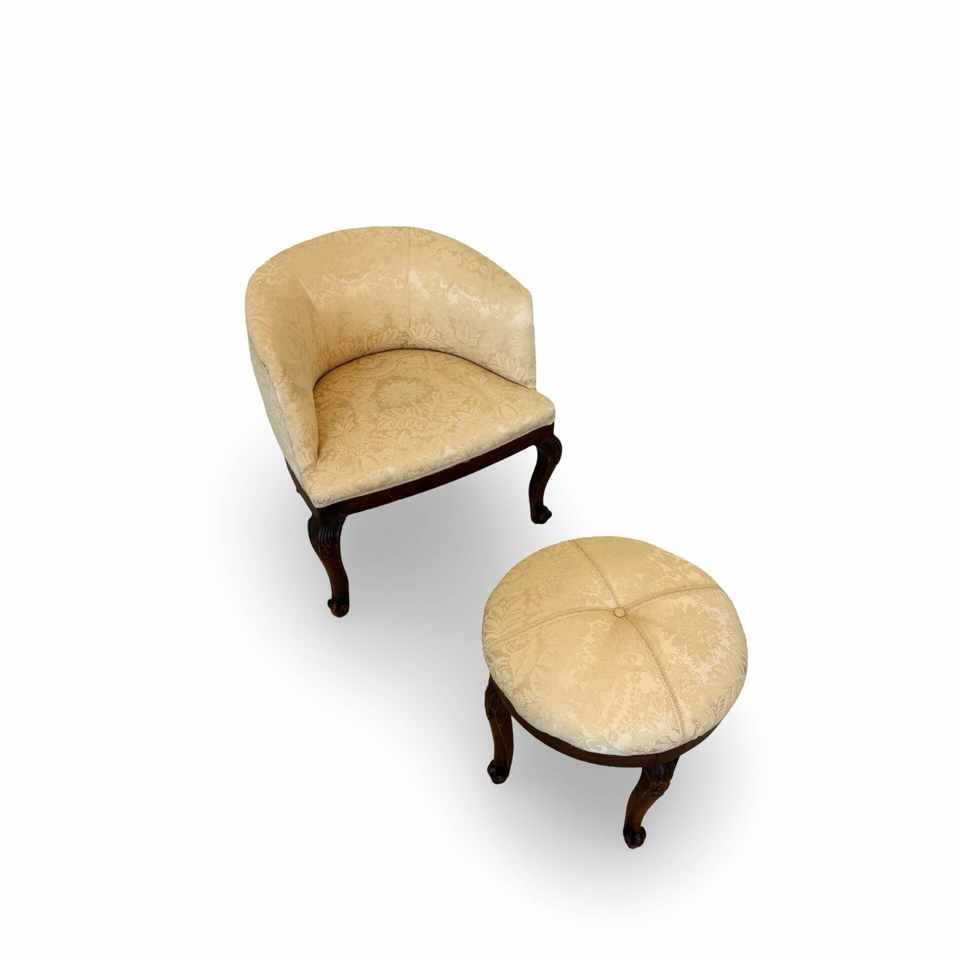 An antique Italian bar chair and a matching tufted vanity stool.