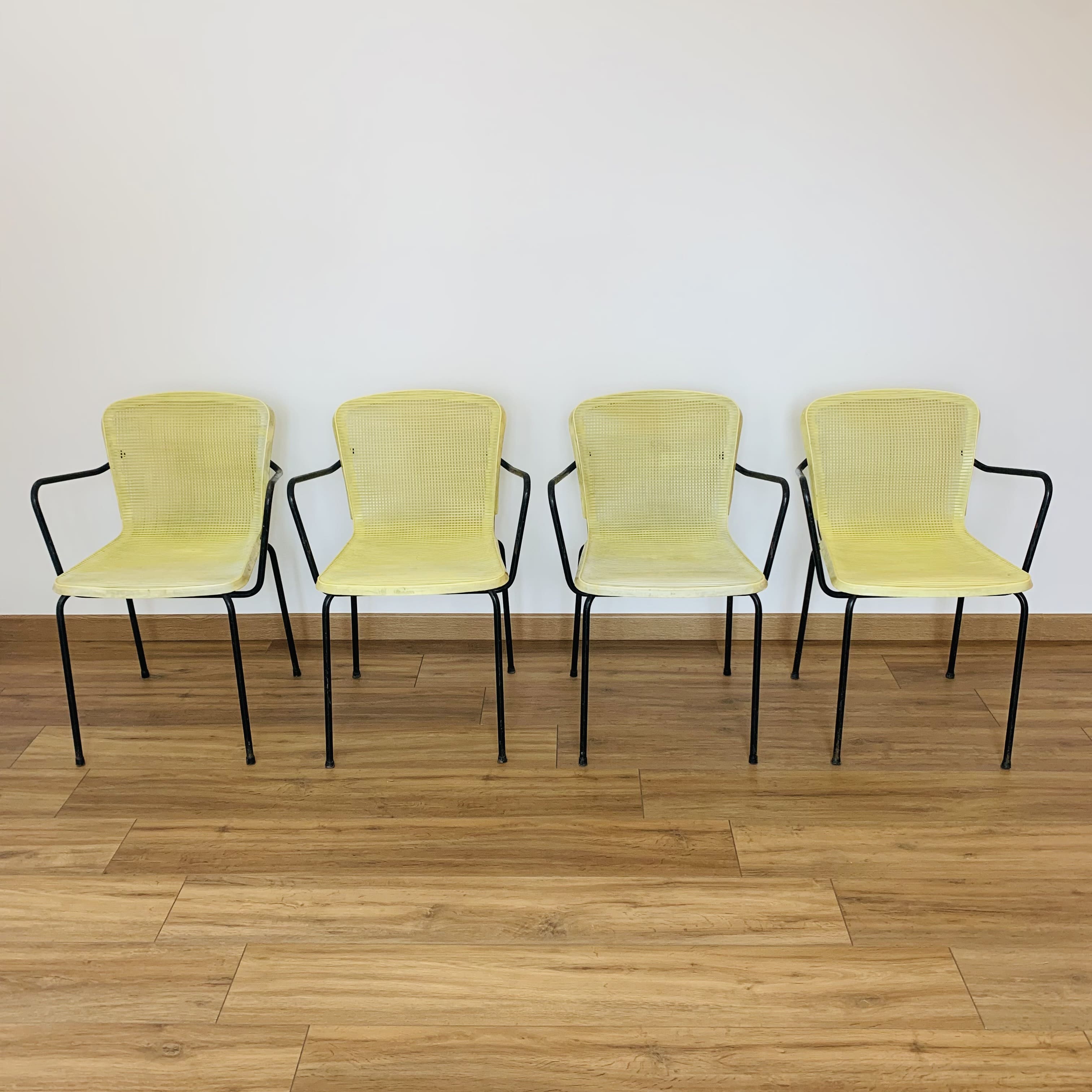 4 yellow outdoor armchairs