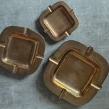 Trio of stackable brass ashtrays