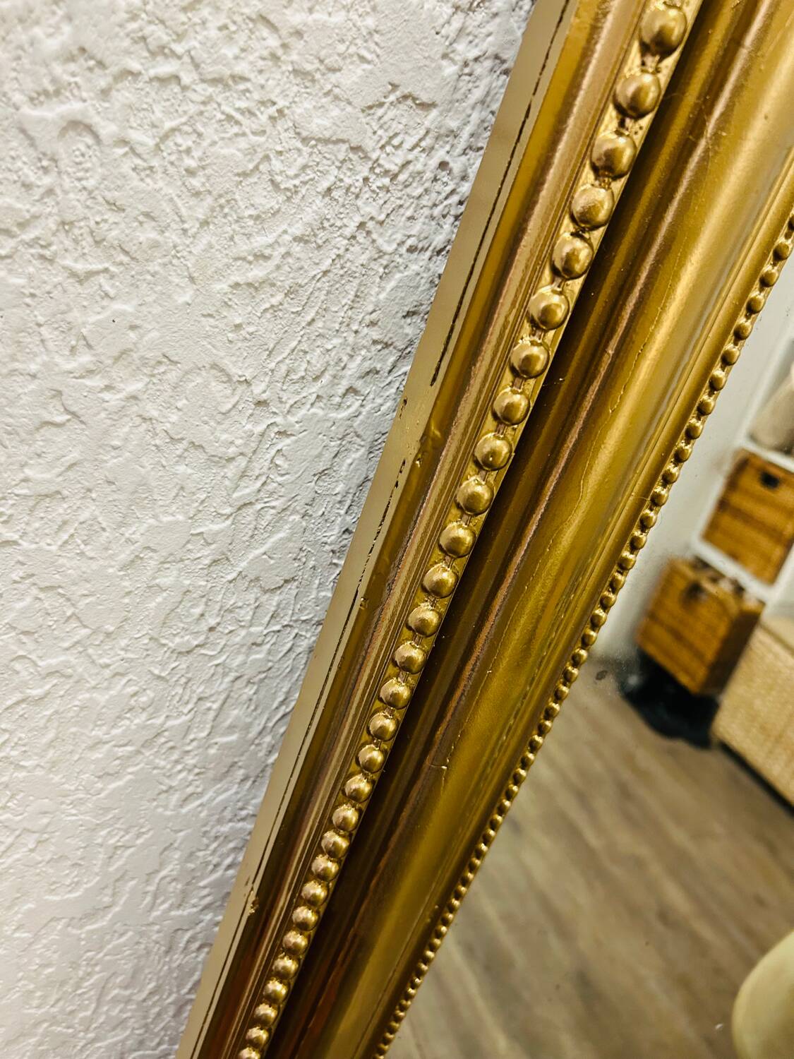 Antique gilded mirror in old Louis Philippe wood