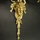 Large pair of wall sconces with male faces in Louis XVI style - bronze