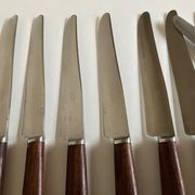 Set de 9 couteaux à manche de bois de palissandre mid century