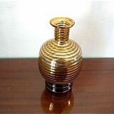 Old vase in blown glass