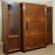 Important Art Deco library in amboyna and mahogany veneer.