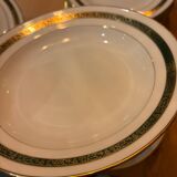 Complete old service in green and gold Limoges porcelain.
