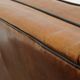 Set of 2 very comfortable large sheepskin armchairs elegantly finished with black piping