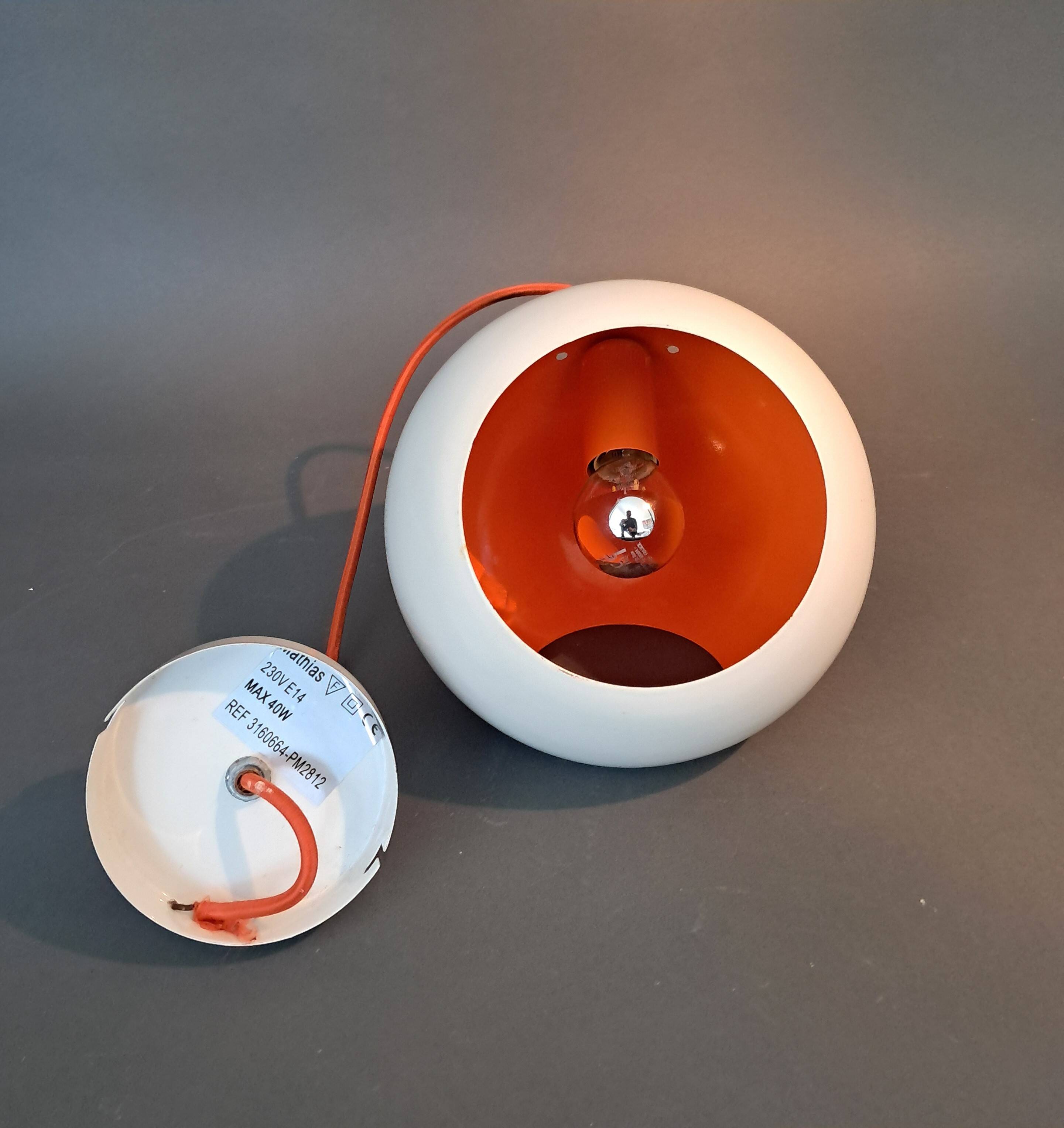 White openwork pendant light with orange interior 1970/1980.