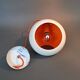 White openwork pendant light with orange interior 1970/1980.