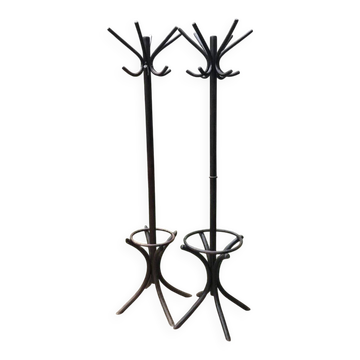 Pair of Hungarian Thonet coat stands in brown wood, 1930s — slender with umbrella holder.