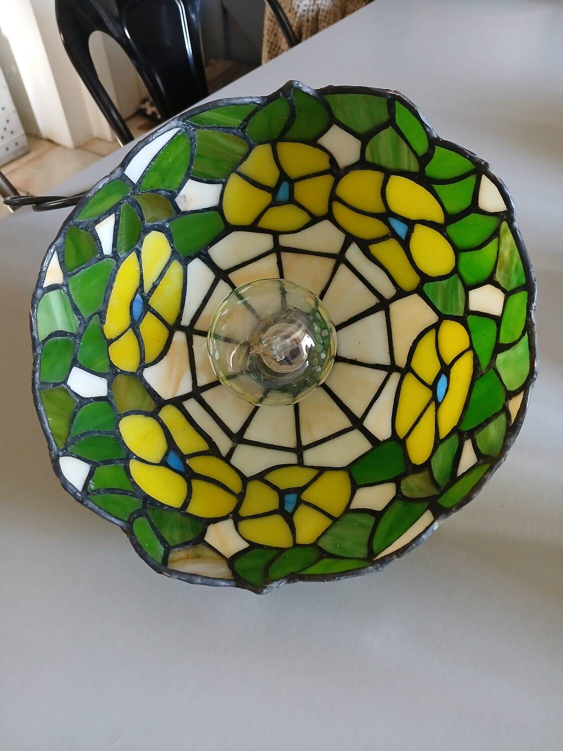 Antique stained glass and tin pendant light