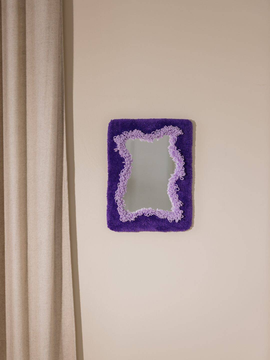Small purple organic mirror