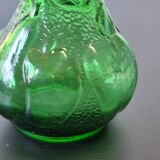 Vintage green glass vase with a fruit design in very good condition.