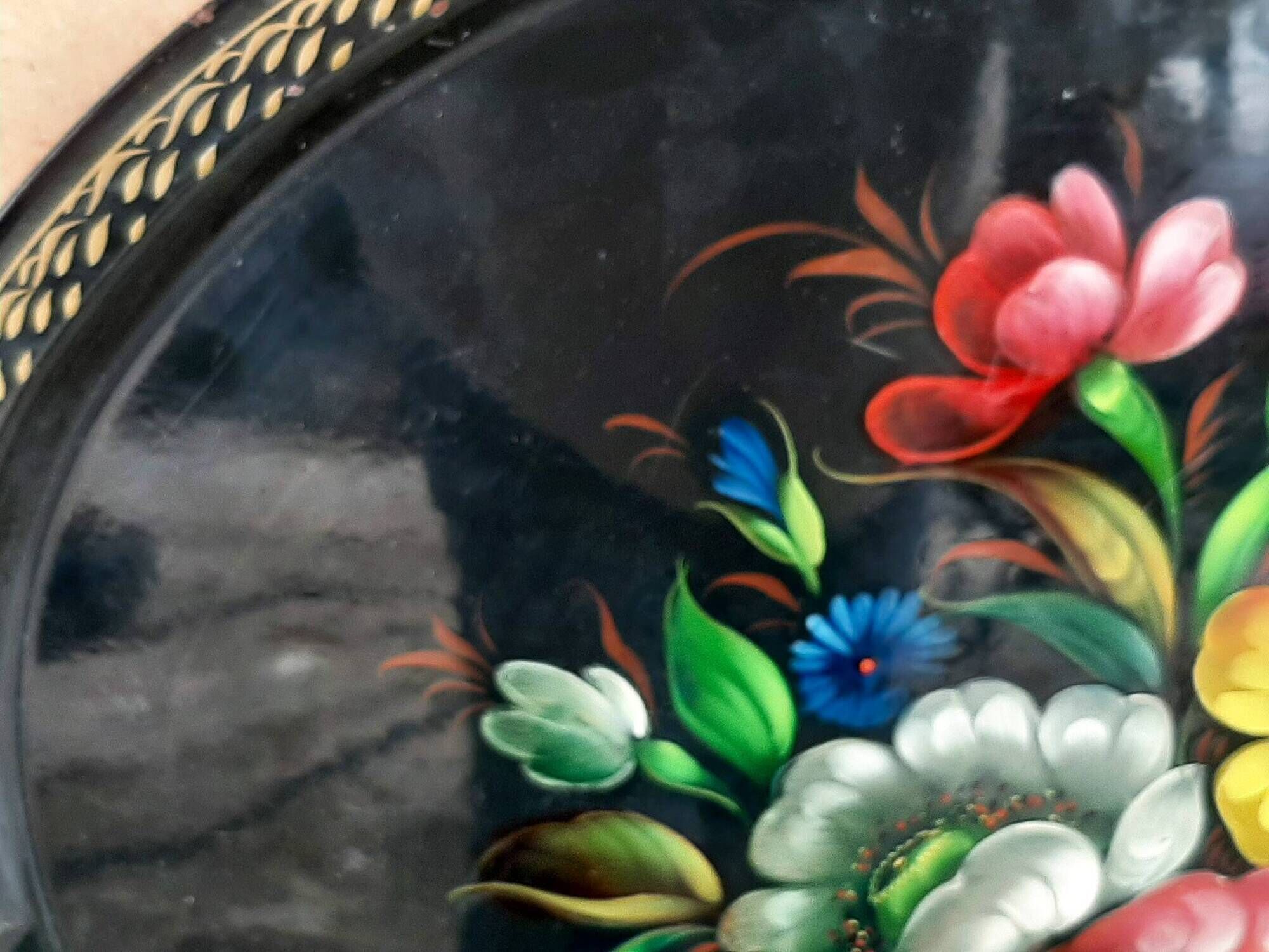 Black lacquered metal tray with multicoloured vintage Russian floral decoration.