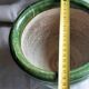 Glazed green terracotta pot.