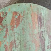 Round coffee table in old green wood