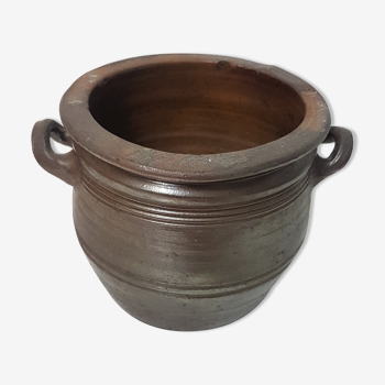 Old varnished sandstone pot