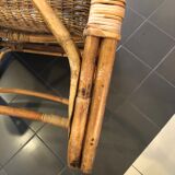 Old wicker rattan armchair