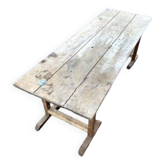 Industrial design of the late nineteenth century: large factory table in natural wood