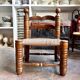 Low chair in dark wood and woven Danish cord attributed to Charles Dudouyt.