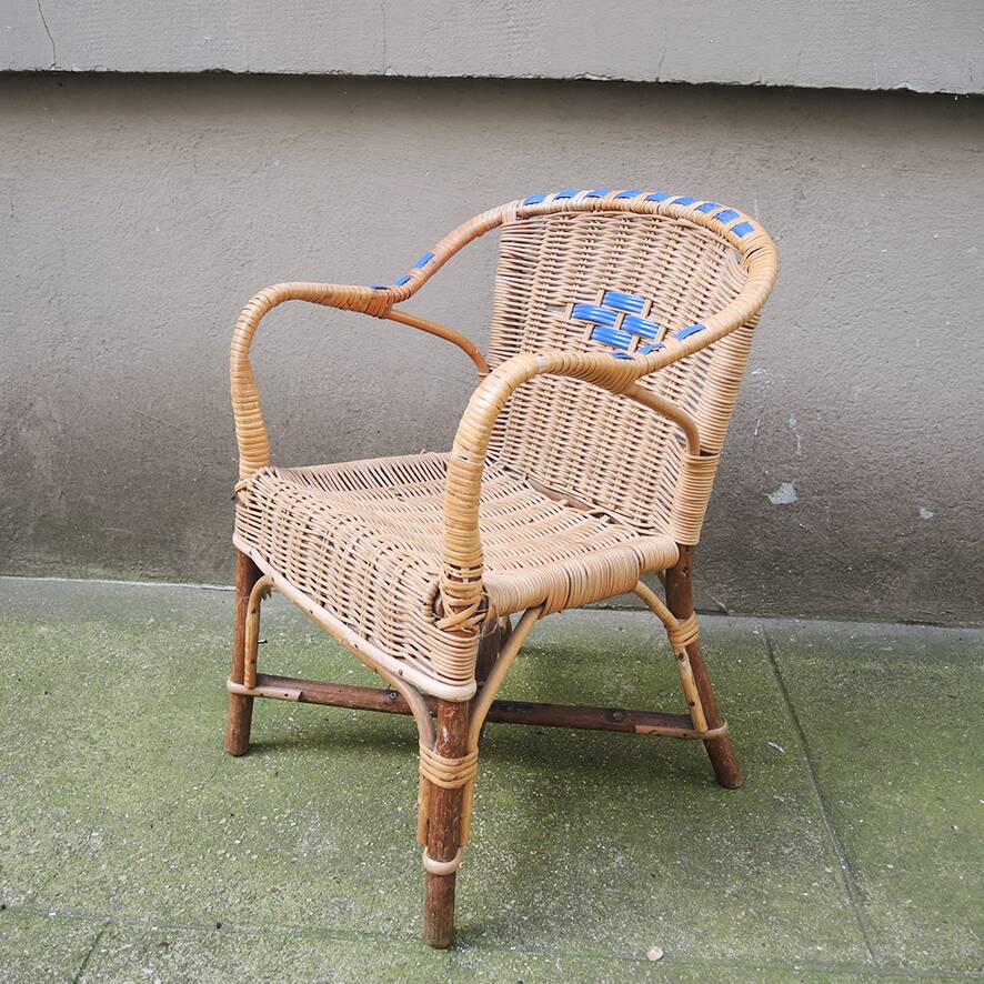 Old wicker chair for children
