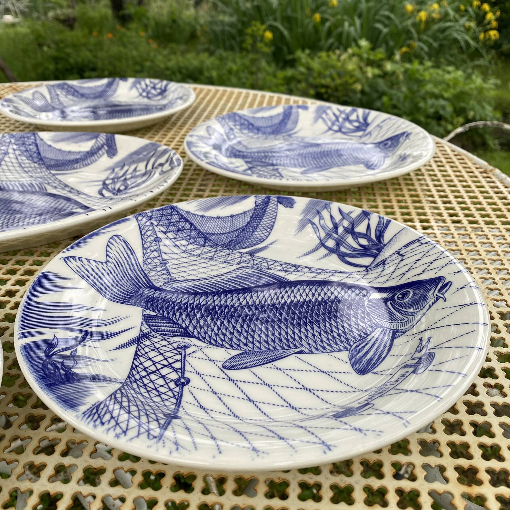 Plates and dish, fish service with cobalt blue decoration.