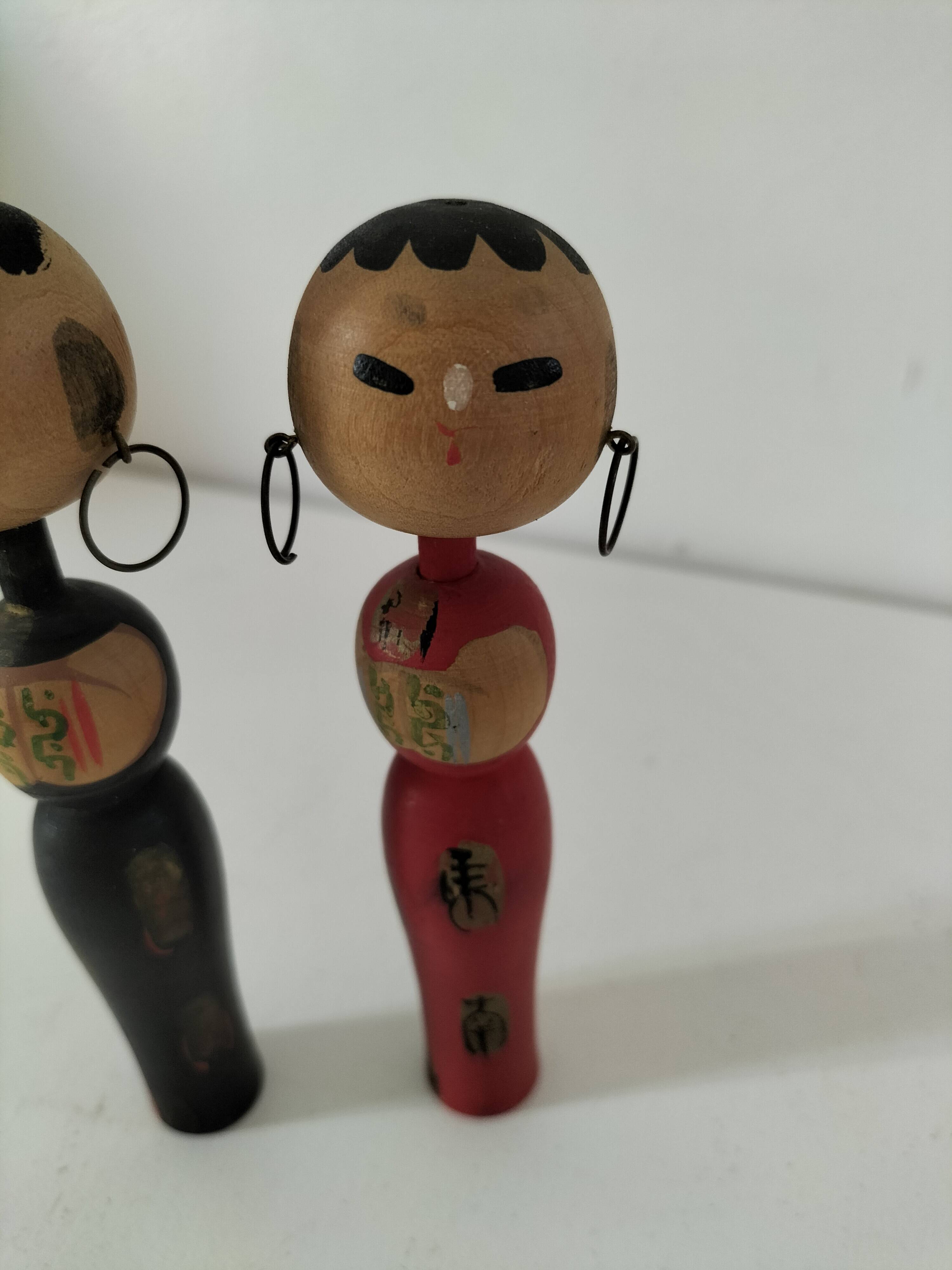 Pair of Japanese Kokeshi dolls - 1950s-1970s