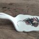 Earthenware pie shovel Obernai décor signed Henri Loux