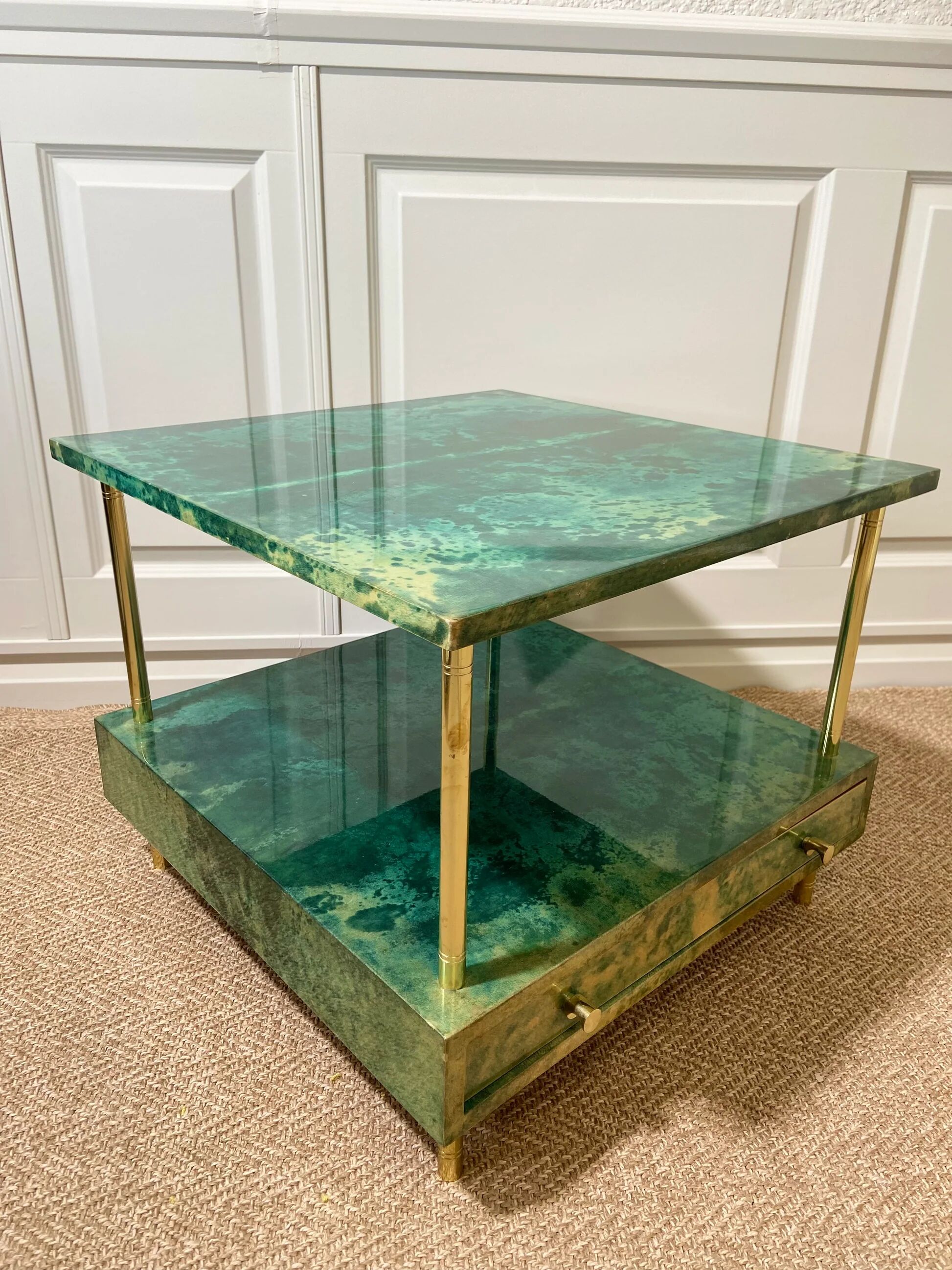 Aldo Tura side table in aqua green with brass legs and lower drawer.