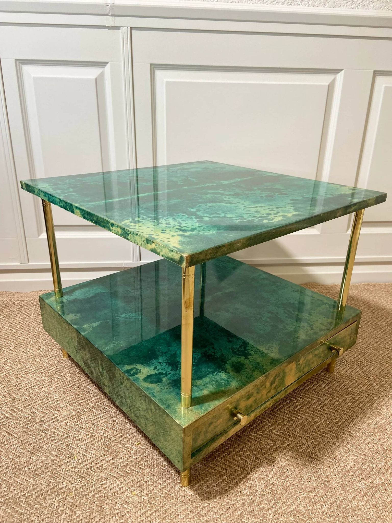 Aldo Tura side table in aqua green with brass legs and lower drawer.