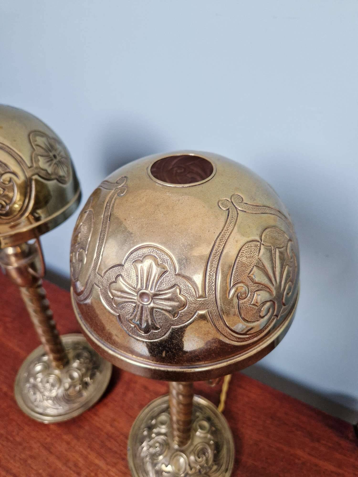 Pair of bronze and brass table lamps, early 20th century