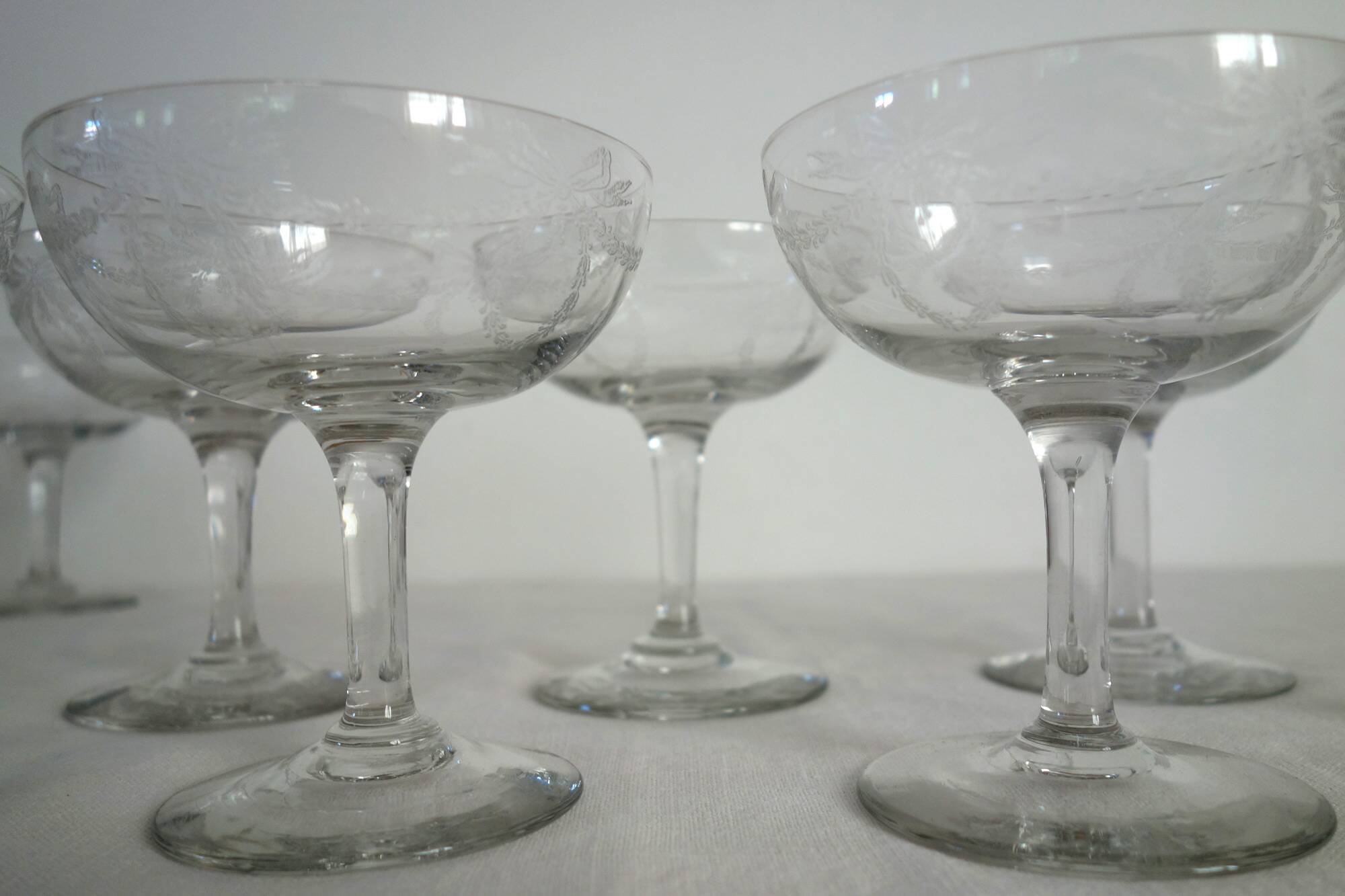 11 vintage engraved crystal champagne coupes