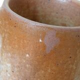 Decanter and enamelled stoneware mugs