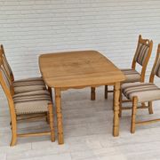 Danish dinning set of table and four chairs in oak and wool.