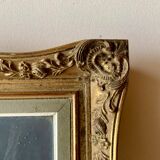 Old gilded carved wooden wall frame