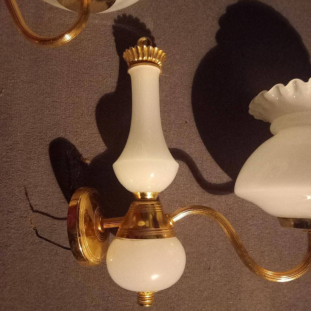 brass and white opaline wall lights