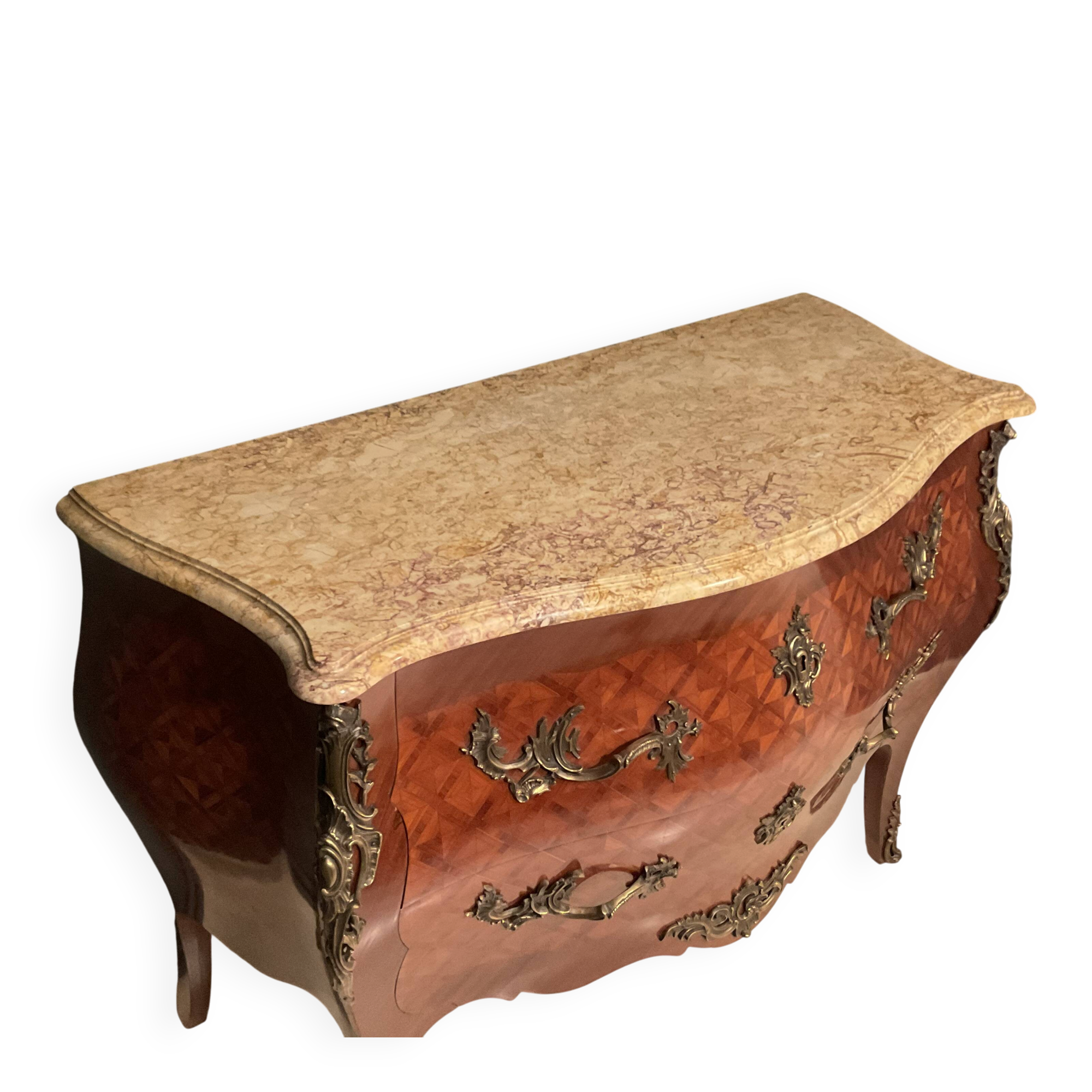 Curved commode with marquetry and marble top.