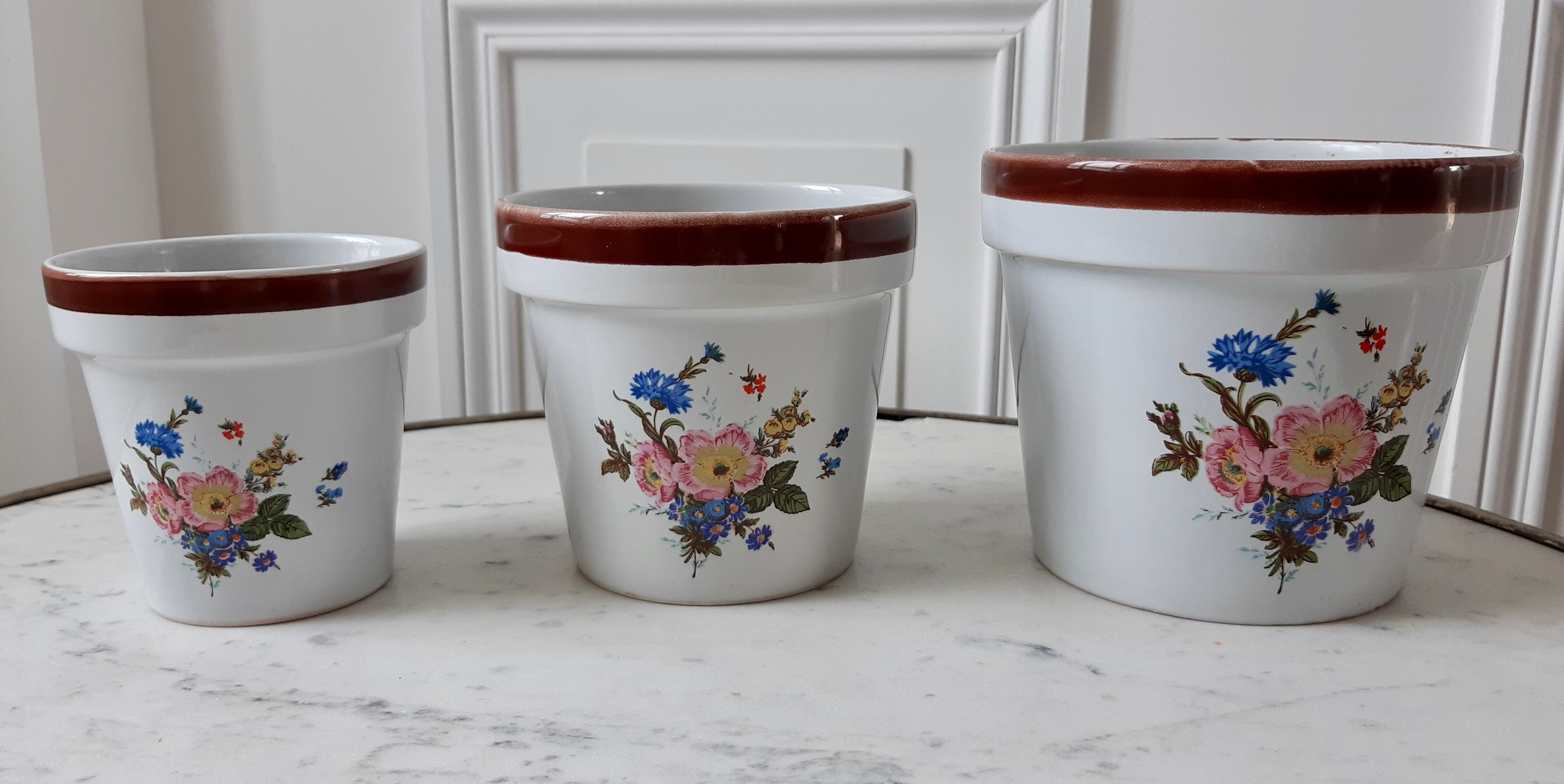 Trio of vintage flowered pot covers 60s