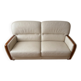 Beige leather sofa with solid wood frame