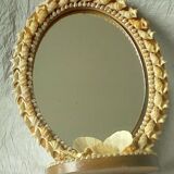 Mirror to be placed in wood and shell