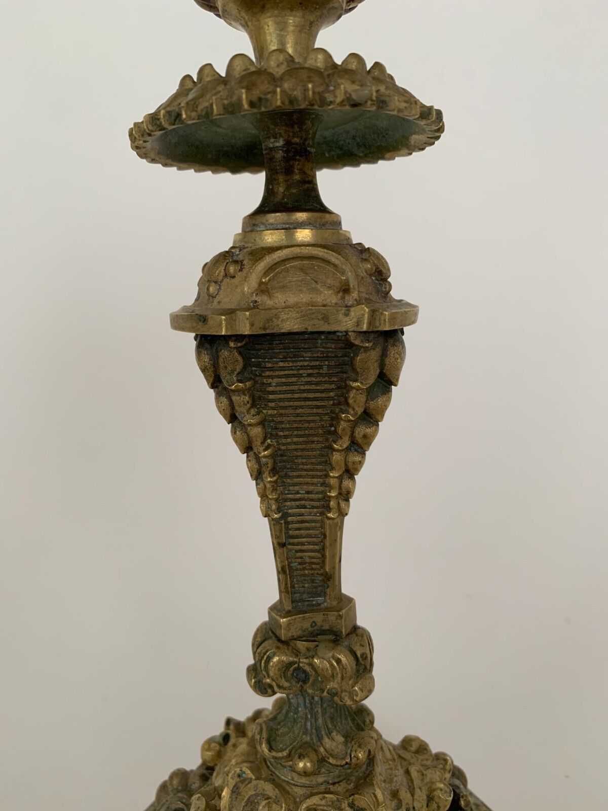 Pair of bronze candle holders with neogothic nineteenth chiseling