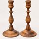 Pair of antique turned wooden candlesticks