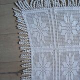 Old crocheted bedside table/plaid